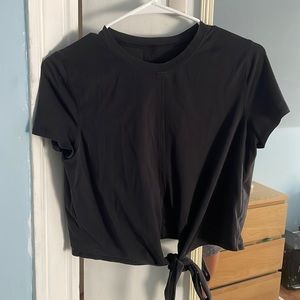 Lululemon cropped black tie in front (or back) t-shirt